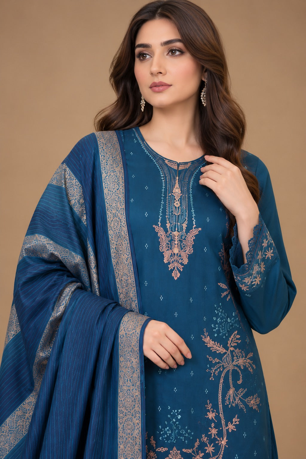 Close up of teal blue Dhanak suit with detailed embroidered neckline and printed shawl