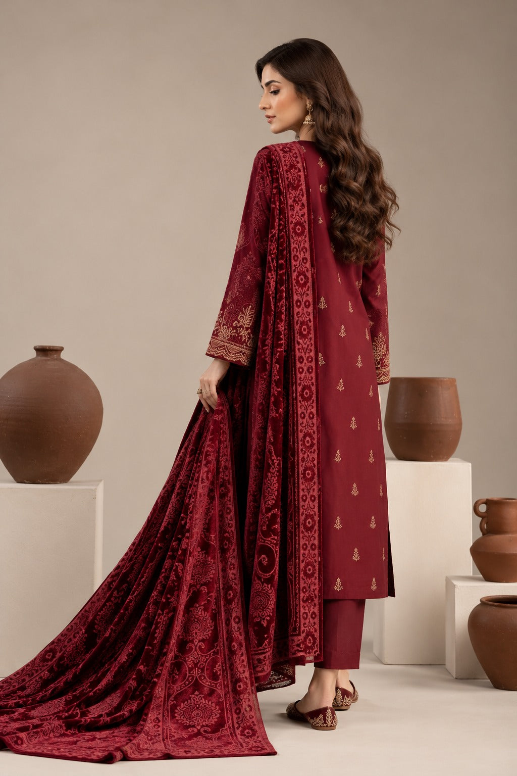 Crimson Maroon embroidered winter suit with velvet shawl, back view styled on a model