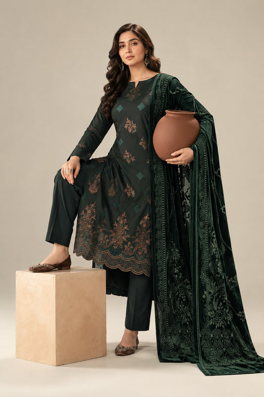 Dark green embroidered winter suit styled on a model with matching velvet shawl, front view