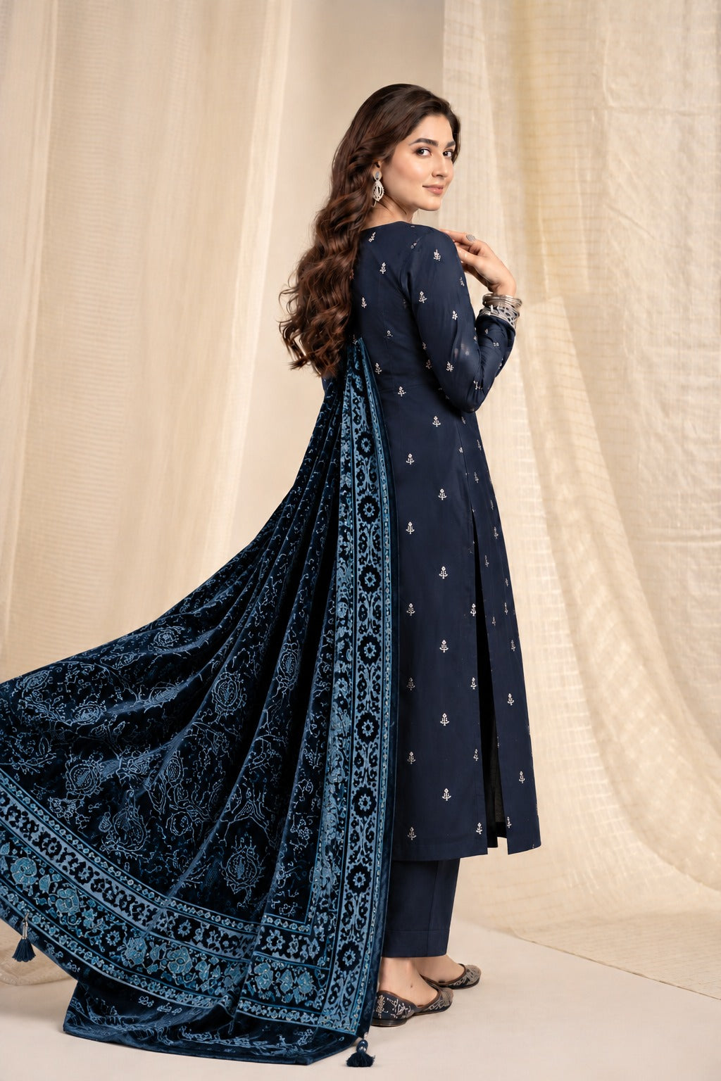 Navy Blue embroidered winter suit with velvet shawl, back view styled on a model